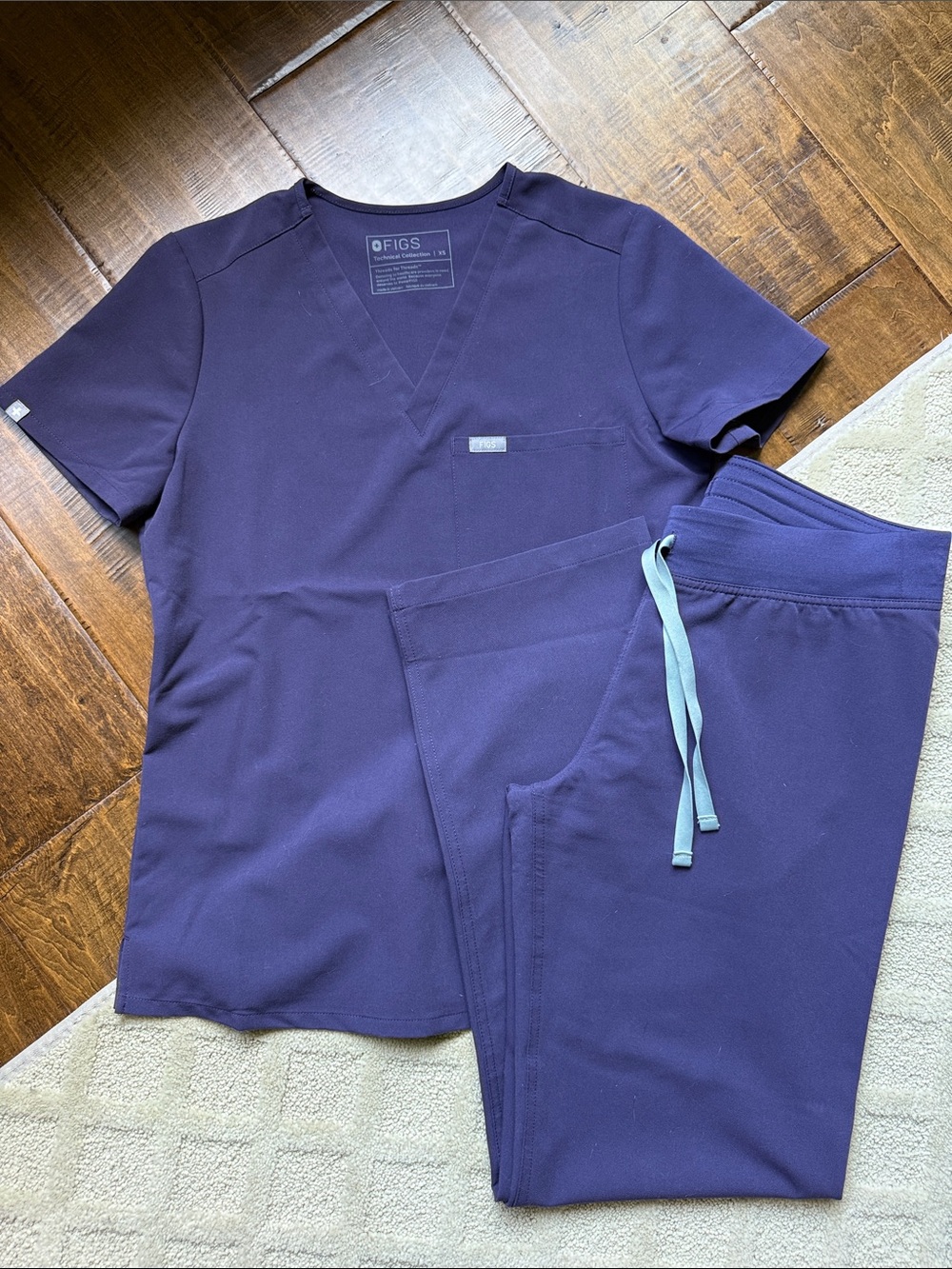 FIGS Women's Scrub Set in Purple with Light Grey Drawstring